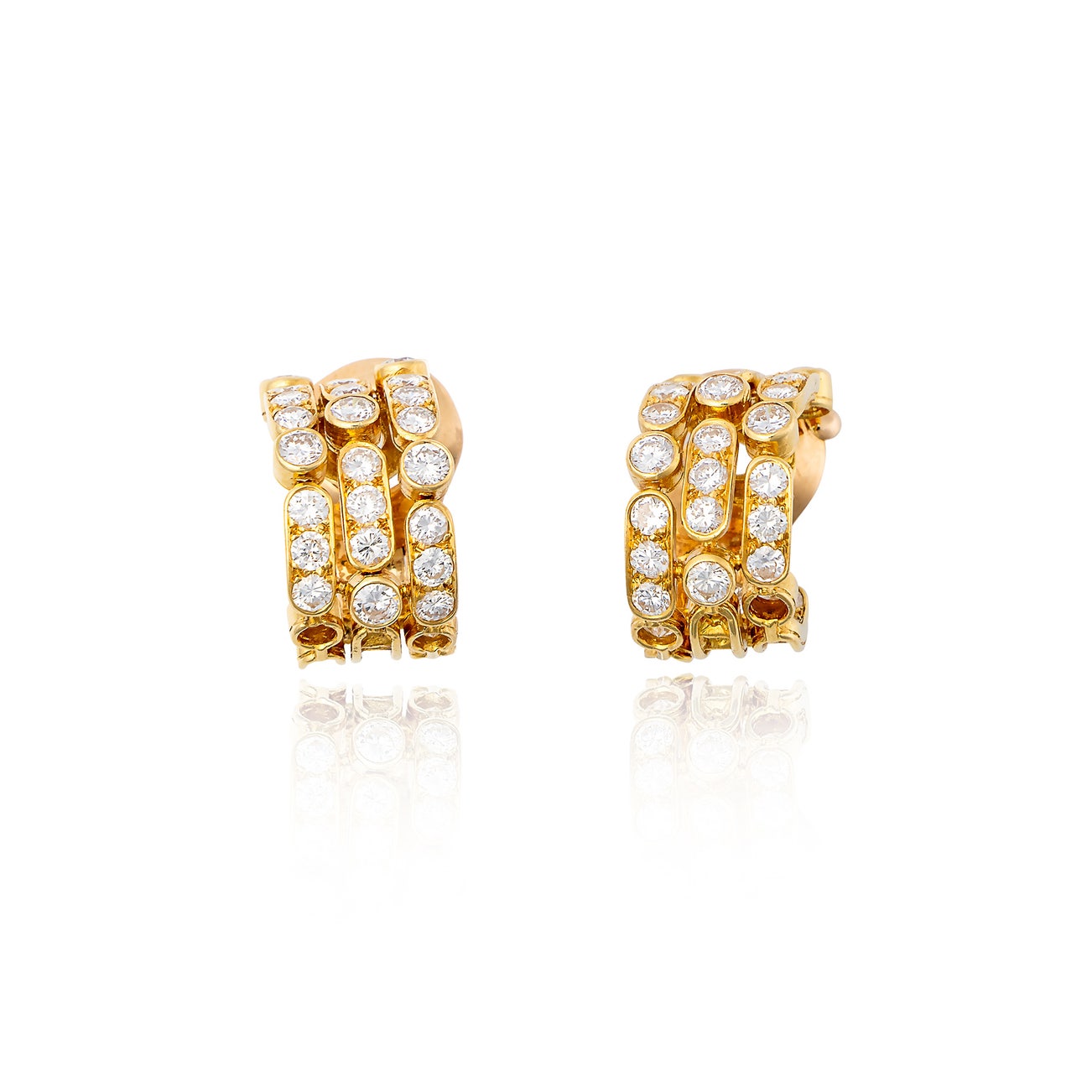 <p><strong>VAN CLEEF & ARPELS </strong><em>Pair of gold and diamond ear clips,</em> CHF4,000–6,000</p>