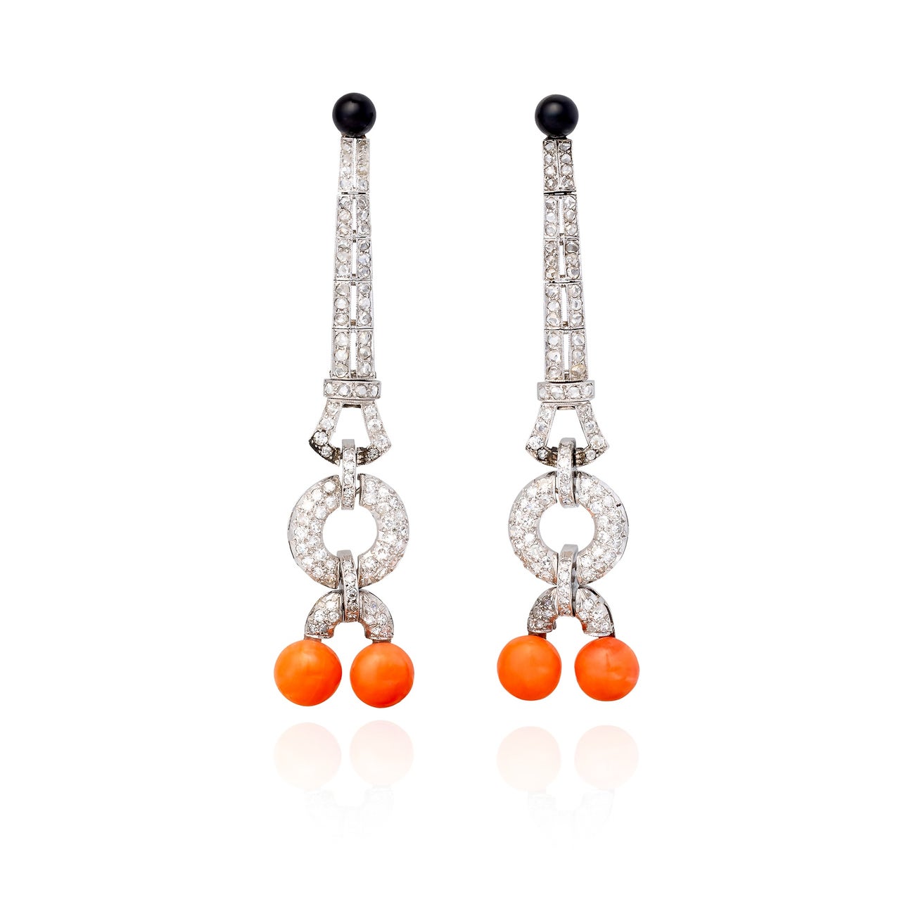 <p><em>Pair of diamond, coral and onyx earrings,</em> 1920s</p>