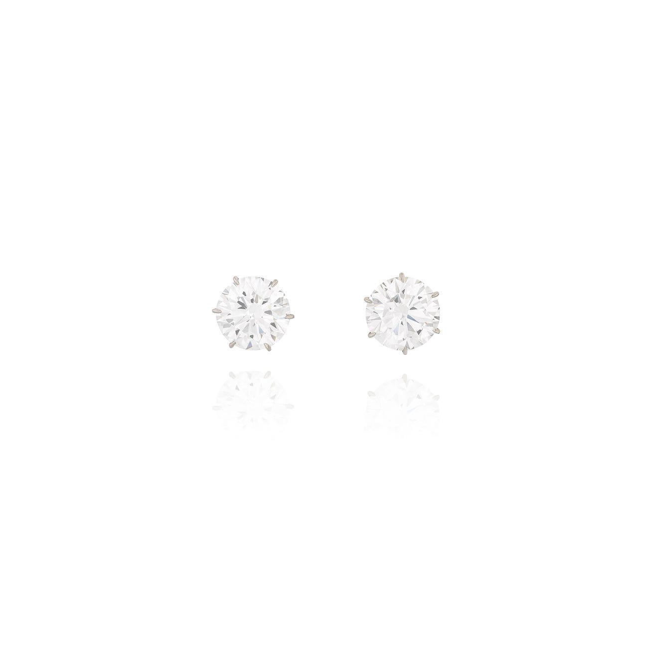 <p><em>Pair of fine diamond stud earrings, weighing 8.00 and 8.28 carats, D Colour, VVS1</em> <em>Clarity, Type IIa</em></p>