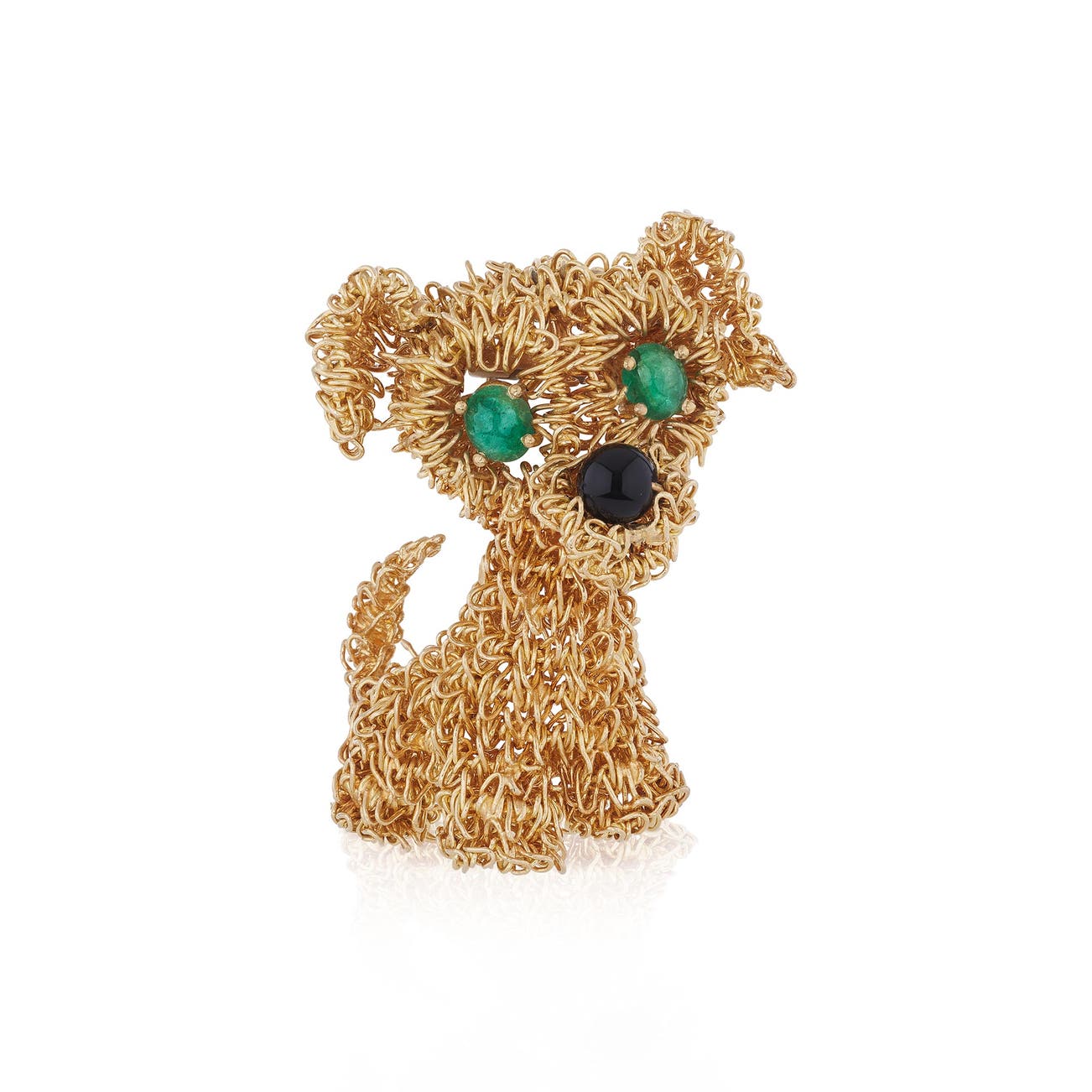 <p><strong>VAN CLEEF & ARPELS</strong> <em>Gold, emerald and onyx brooch, 'Puppy', 1966, </em>CHF6,500–10,000</p>