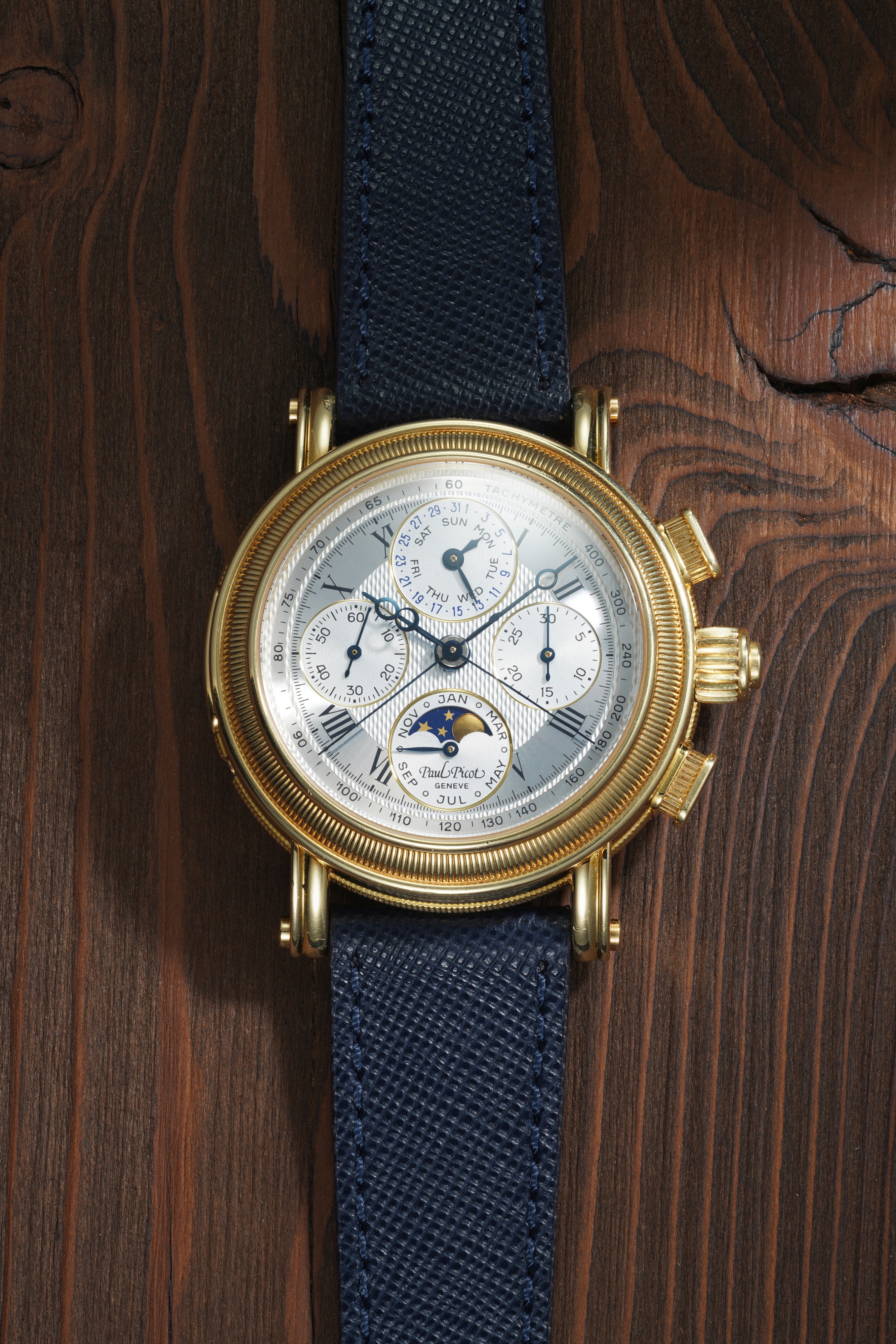 An elegant full calendar split seconds yellow gold chronograph w
