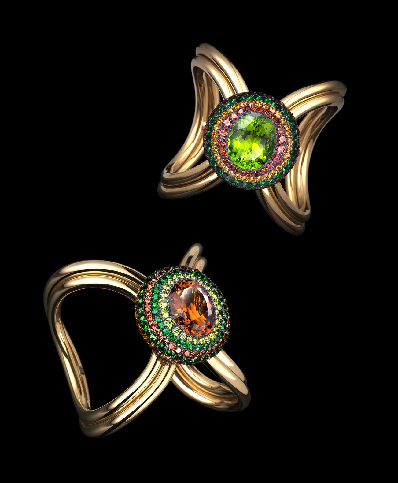 <b>XO CUFFS</b> peridot, tourmalines, spinels, garnets, silver and gold © Lauren Adriana, photographed by Richard Valencia