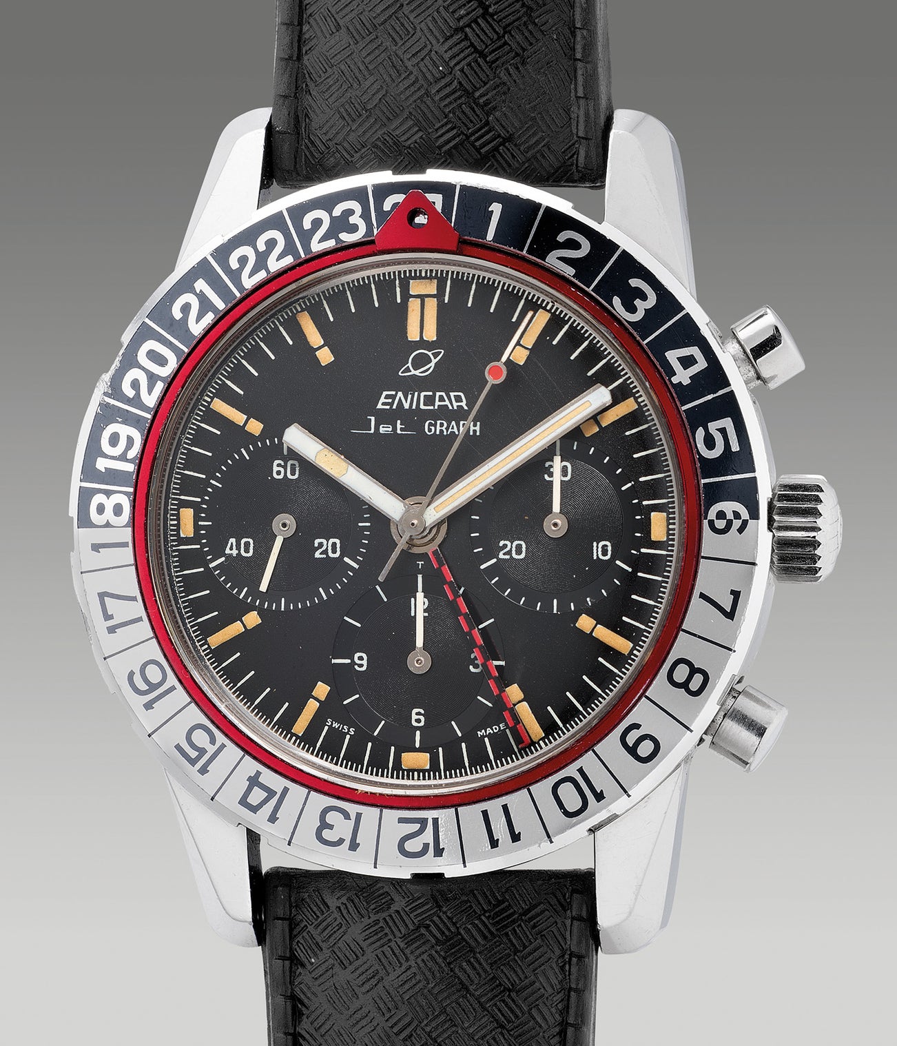 An attractive, well-preserved and rare stainless steel dual time