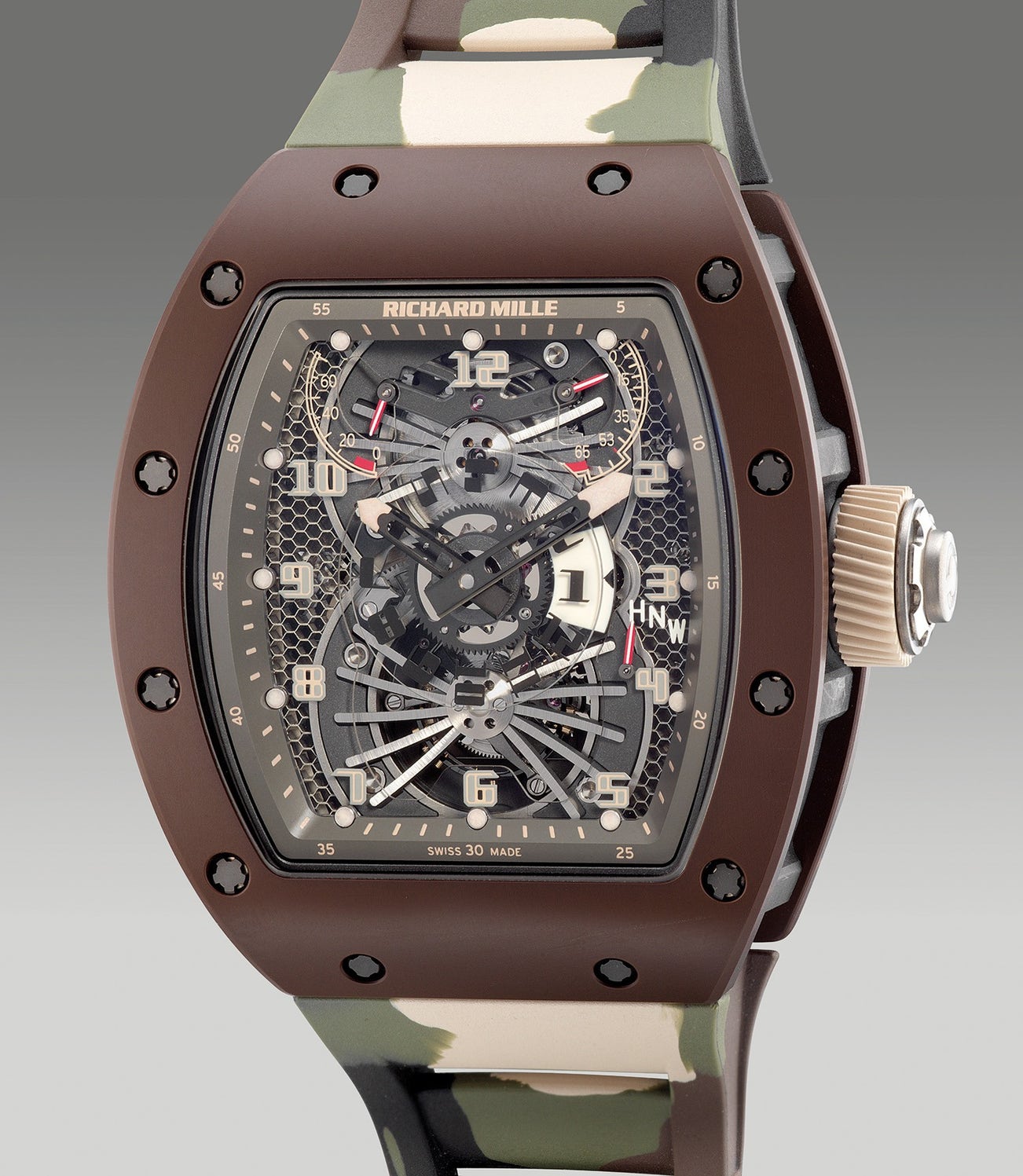 <p><strong>RICHARD MILLE</strong>&nbsp;- RM022 - An attractive and very rare limited edition brown ceramic, carbon TPT tonneau-shaped dual-time, tourbillon, with function selector, power reserve and torque indication, original warranty and presentation box, numbered 05 of a limited edition of 10 pieces, circa 2018</p>

