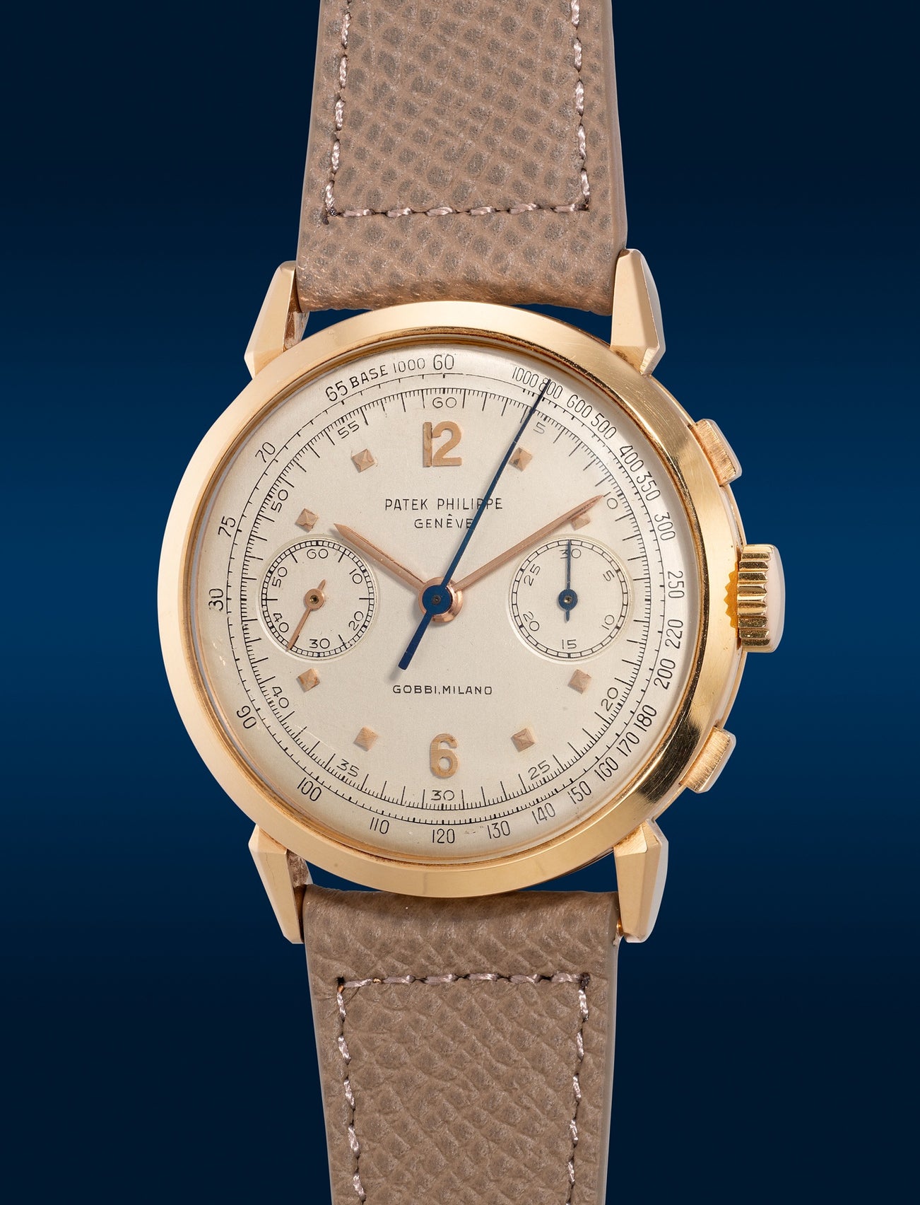 <p><strong>PATEK PHILIPPE</strong> <em>Ref. 1579 in pink gold with Certificate of Origin and presentation box</em>, Circa 1952</p>