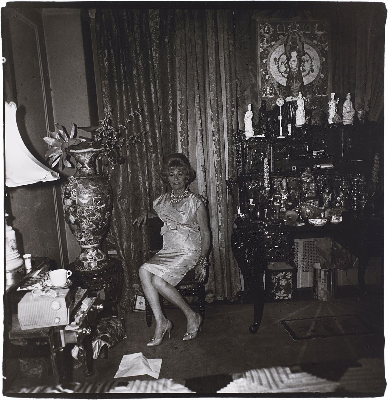 <b>DIANE ARBUS</b> <i>A widow in her bedroom on 55th St., NYC,</i> 1962