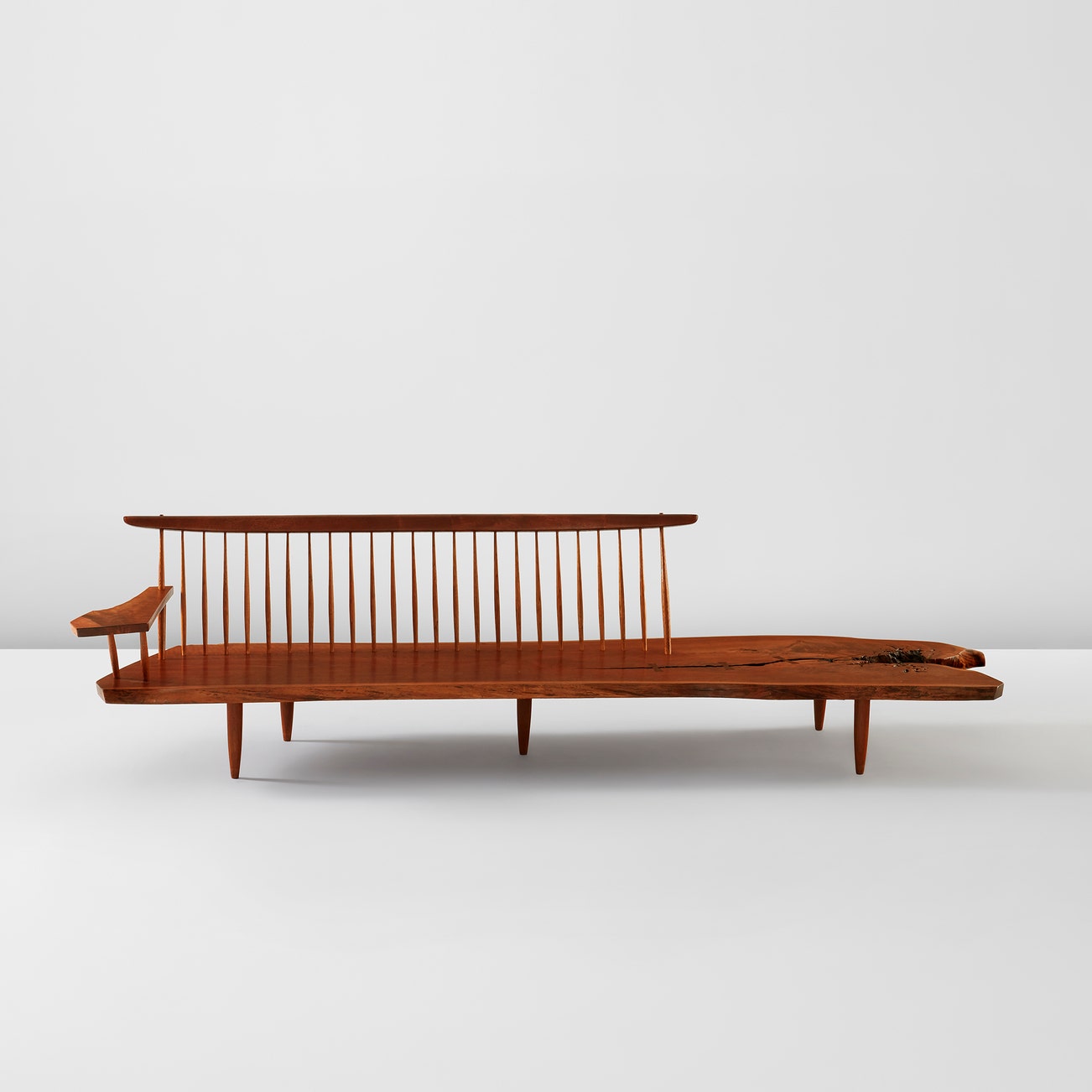 <p><strong>GEORGE NAKASHIMA</strong> <em>"Conoid" bench with single free-form arm,</em> $120,000–180,000</p>