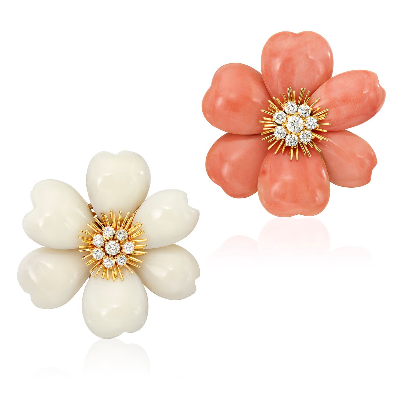 <p><strong>VAN CLEEF & ARPELS</strong> <em>Two Coral and Diamond Brooches, ‘Rose de Noel’,</em> $30,000–40,000</p>