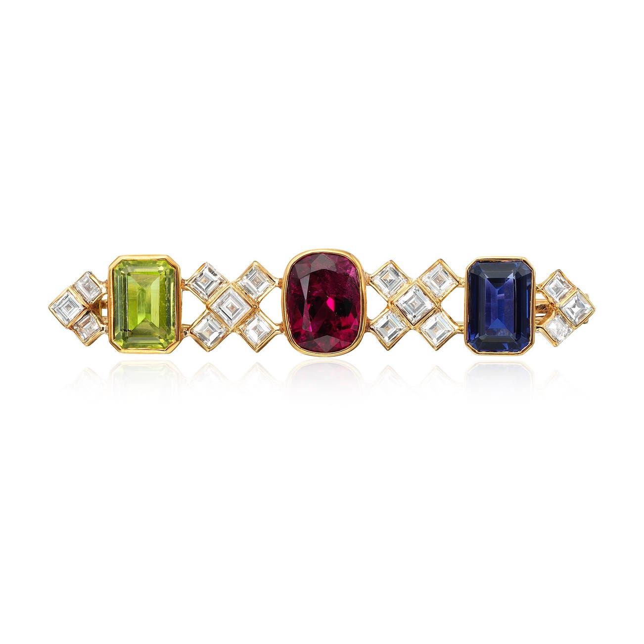 <p><em>Peridot, Garnet, Spinel and Diamond Brooch,</em> $5,000&ndash;6,000</p>
