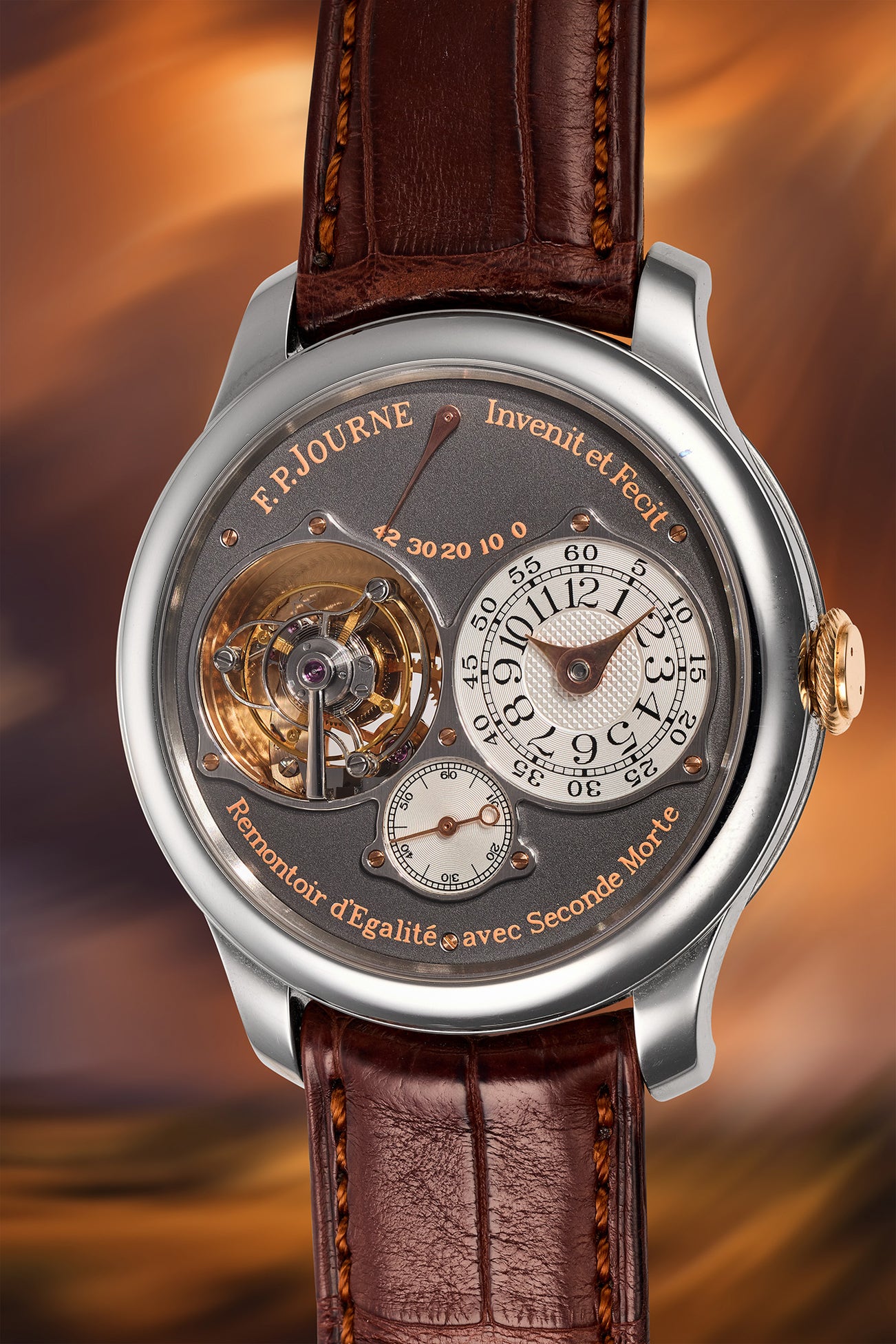 <p><strong>F.P. JOURNE</strong> <em>Tourbillon Souverain Anniversaire “Hong Kong”, titanium and 18K pink gold, numbered 1/5</em>, $600,000–1,200,000 USD</p>