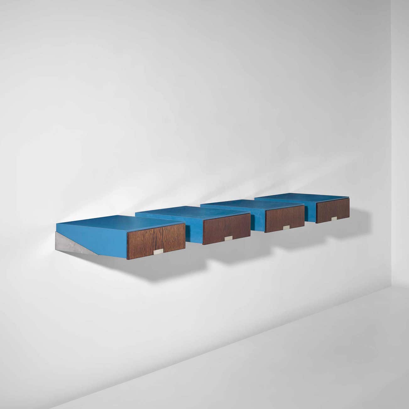 <p><strong>ARNE JACOBSEN</strong> <em>Set of four wall-mounted drawers, </em>from <em>the SAS Royal Hotel, Copenhagen, </em>&pound;12,000&ndash;18,000</p>
