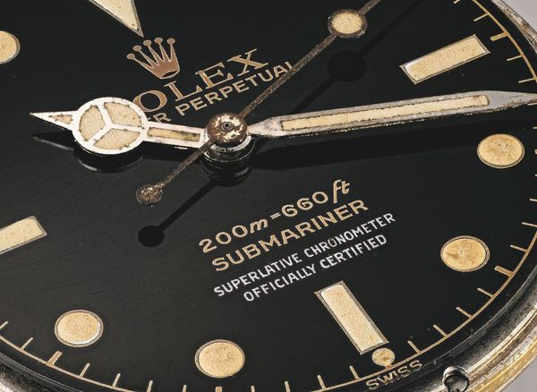 A Look in the Mirror: Admiring the Rolex Gilt / Gloss Dial