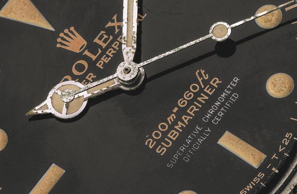 A Look in the Mirror: Admiring the Rolex Gilt / Gloss Dial