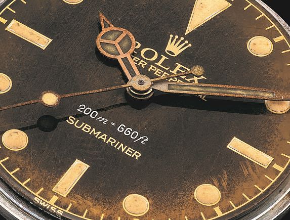 A Look in the Mirror: Admiring the Rolex Gilt / Gloss Dial