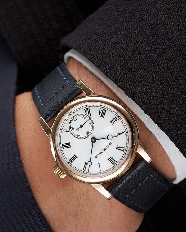 A Philippe Dufour Simplicity "Prototype 000" from 2000 in 18k pink gold with white lacquer dial.