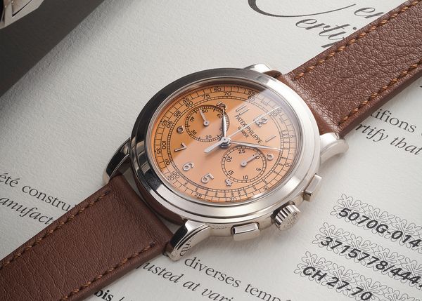 A circa 2015 Patek Philippe Chronograph Ref. 5070G-014 'Saatchi Edition' in 18k white gold with a salmon dial, included in the Phillips Geneva Watch Auction: XXIII.