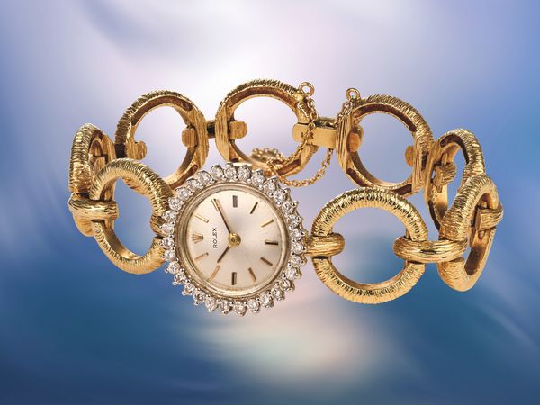 Lot 93: A Rolex Ref. 1400 Cocktail in yellow gold with diamonds, included in the PHILLIPS New York Watch Auction: XIV.