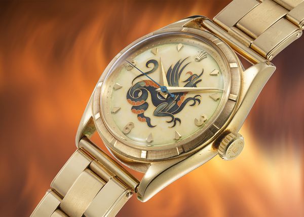 A 1952 Rolex 'The Dragon' Ref. 6085 in 18k yellow gold with cloisonné enamel dial by Nelly Richard, included in the Phillips Geneva Watch Auction: XXIII.