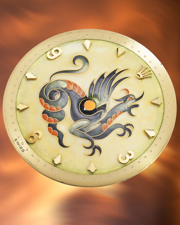 1952 Rolex 'The Dragon' Ref. 6085 in 18k yellow gold with cloisonné enamel dial by Nelly Richard, included in the Phillips Geneva Watch Auction: XXIII.