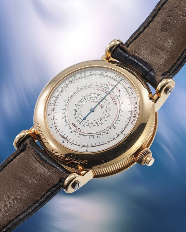 A circa 1991, unique Franck Genève 'Janus' World-Time Single-Button, Double-Sided Chronograph in 18k yellow gold that's included in the Phillips Geneva Watch Auction: XXIII.