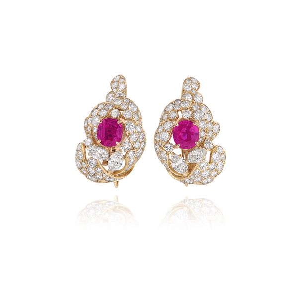 Lot 352: M. Gérard, Pair of pink sapphire and diamond ear clips. Burmese pink sapphires weighing 4.08 carats and 5.05 carats, no heat. Estimates: CHF90,000–120,000 / US$110,000–150,000.