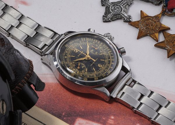 The Story Of RAF Wing Commander Douglas S. Dickins And His Rolex Chronograph 'POW'