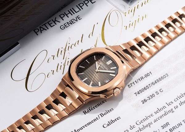 Lot 79: A 2021 Patek Philippe Nautilus Ref. 5711/1R-001 in 18k pink gold that's included in the Phillips Geneva Watch Auction: XXIII. Estimate: CHF 90,000 - 180,000