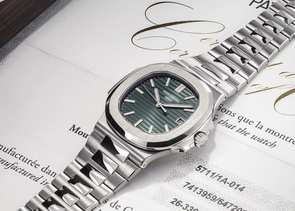 Lot 53: A 2021 Patek Philippe Nautilus Ref. 5711/1A-014 in stainless steel with green dial that's included in the Phillips Geneva Watch Auction: XXIII. Estimate: CHF 100,000 - 200,000