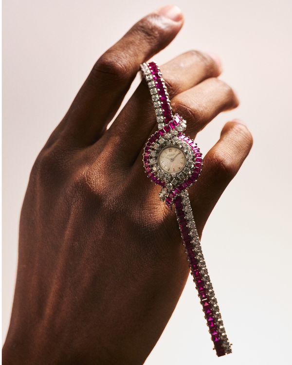 Lot 24: A Patek Philippe Ref. 3205/43 Diamond- and Ruby-Set Platinum Timepiece from 1964, included in the PHILLIPS New York Watch Auction: XIV. Estimate: US$50,000–100,000.