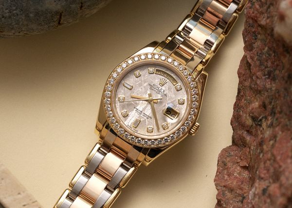 Rolex Day-Date watch.