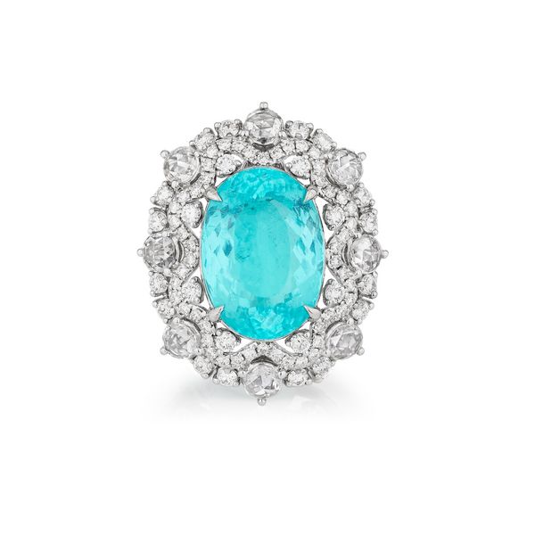 Lot 359: Paraiba tourmaline and diamond ring/pendant combination. Paraiba tourmaline weighing 14.15 carats, natural, no heat. Estimates: CHF60,000–80,000 / US$70,000–100,000.