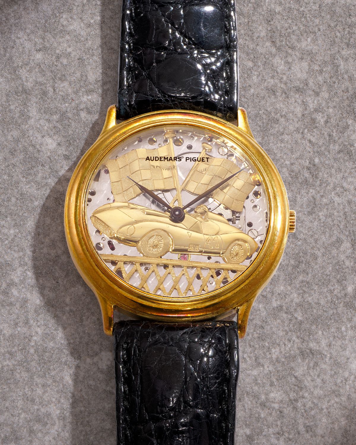 Lot 8075: A 1992 Audemars Piguet Ref. 14677BA.OO.A001CR.01 in 18k yellow gold with an engraved “Ferrari 315 S” motif dial, included in the Phillips Hong Kong Sessions, Fall 2026. Estimate: HKD $80,000–160,000