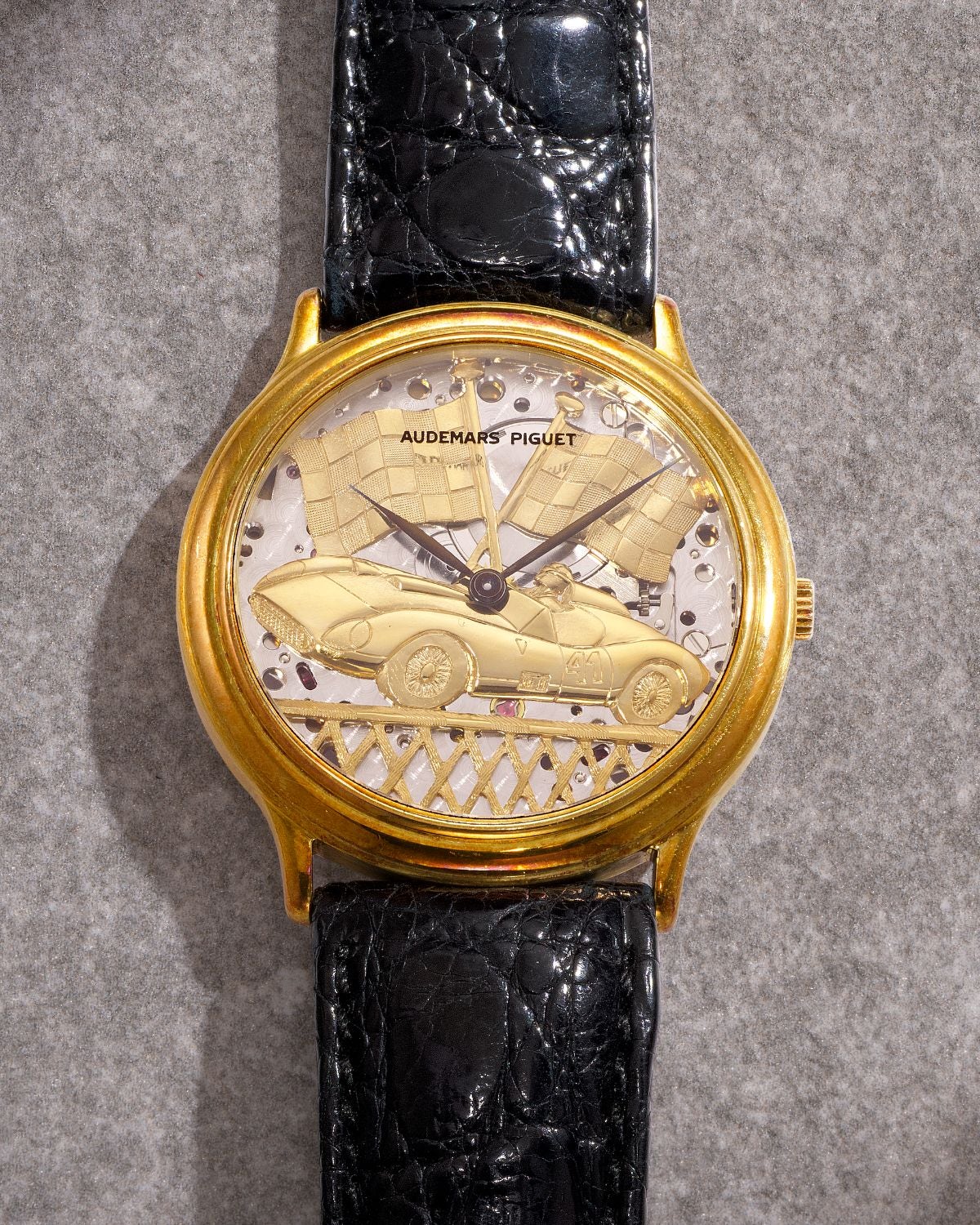 Lot 8075: A 1992 Audemars Piguet Ref. 14677BA.OO.A001CR.01 in 18k yellow gold with an engraved “Ferrari 315 S” motif dial, included in the Phillips Hong Kong Sessions, Fall 2026. Estimate: HKD $80,000–160,000