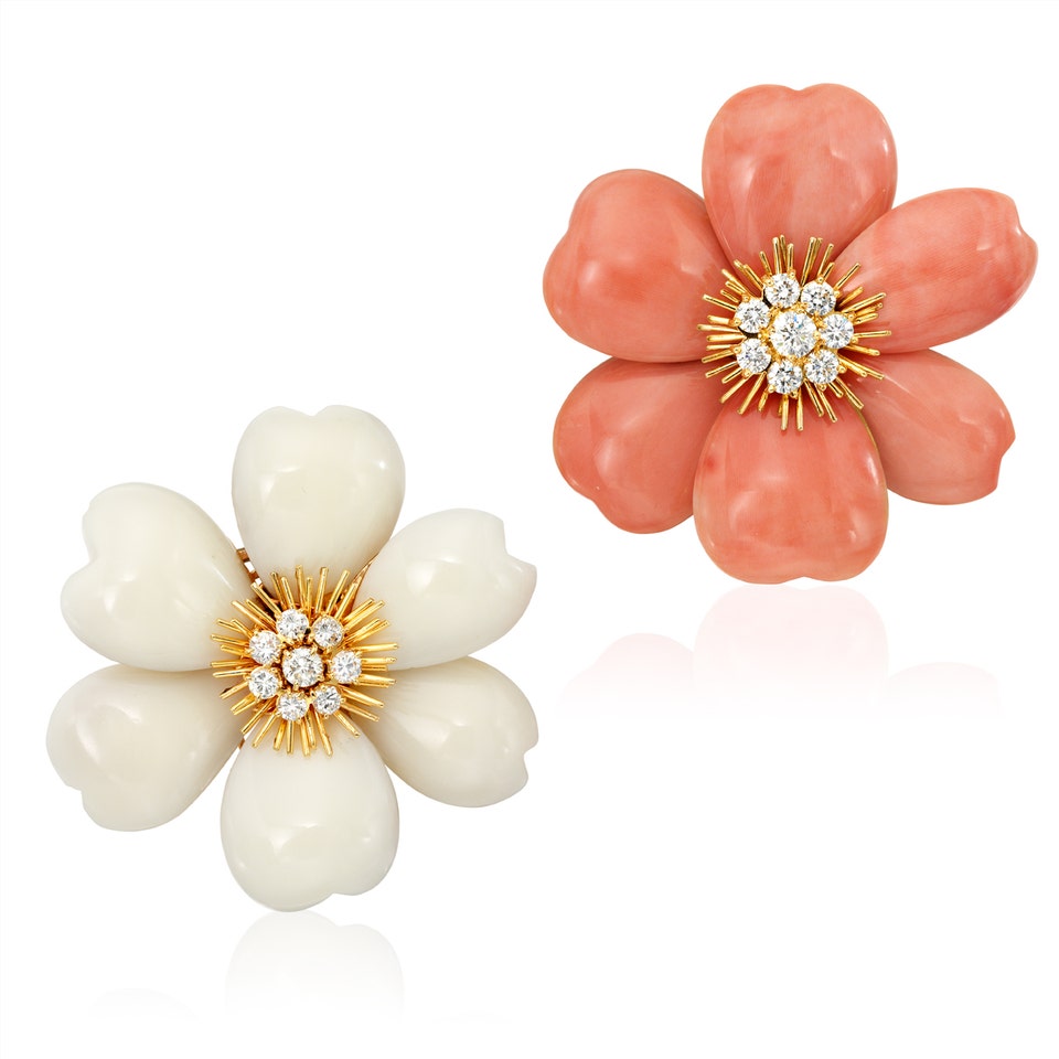 VAN CLEEF & ARPELS Two Coral and Diamond Brooches, 'Rose de Noël'. Estimate: $30,000–40,000 Sold for $49,020