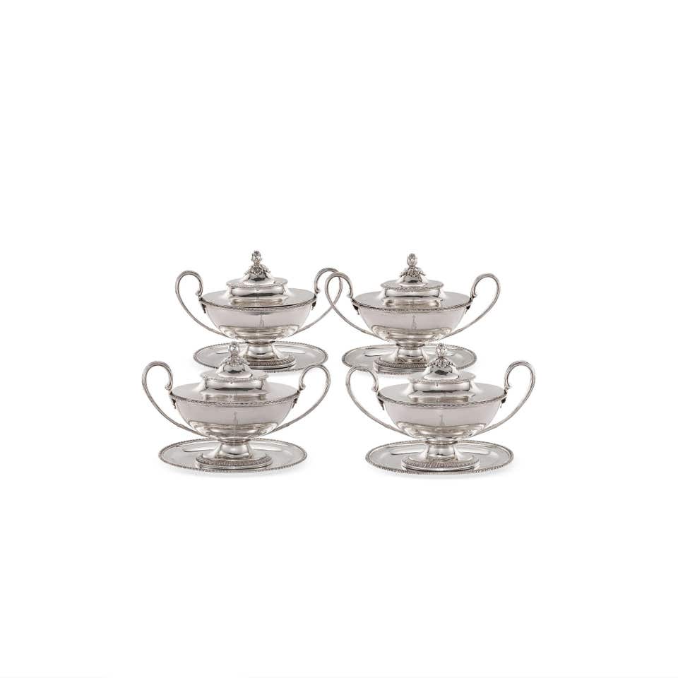 Thomas Evans and Edmund Vincent, Four silver sauce tureens and four silver presentation stands. The Geneva Jewels Auction VII.