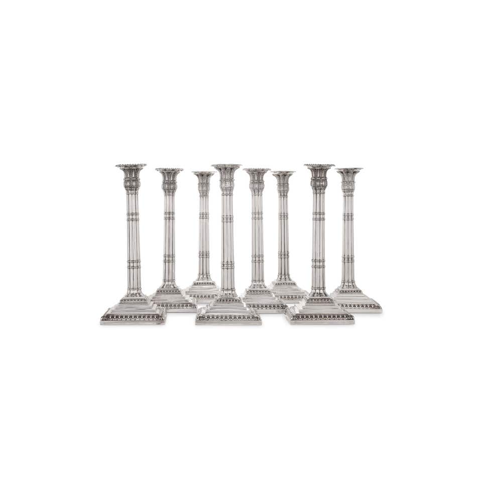 Ebenezer Coker and John Parker I & Edward Wakelin Set of eight silver candlesticks, 18th century. The Geneva Jewels Auction: VII.