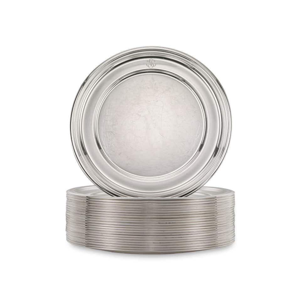 FRATELLI CACCHIONE, Twenty four silver presentation plates. The Geneva Jewels Auction: VII. 