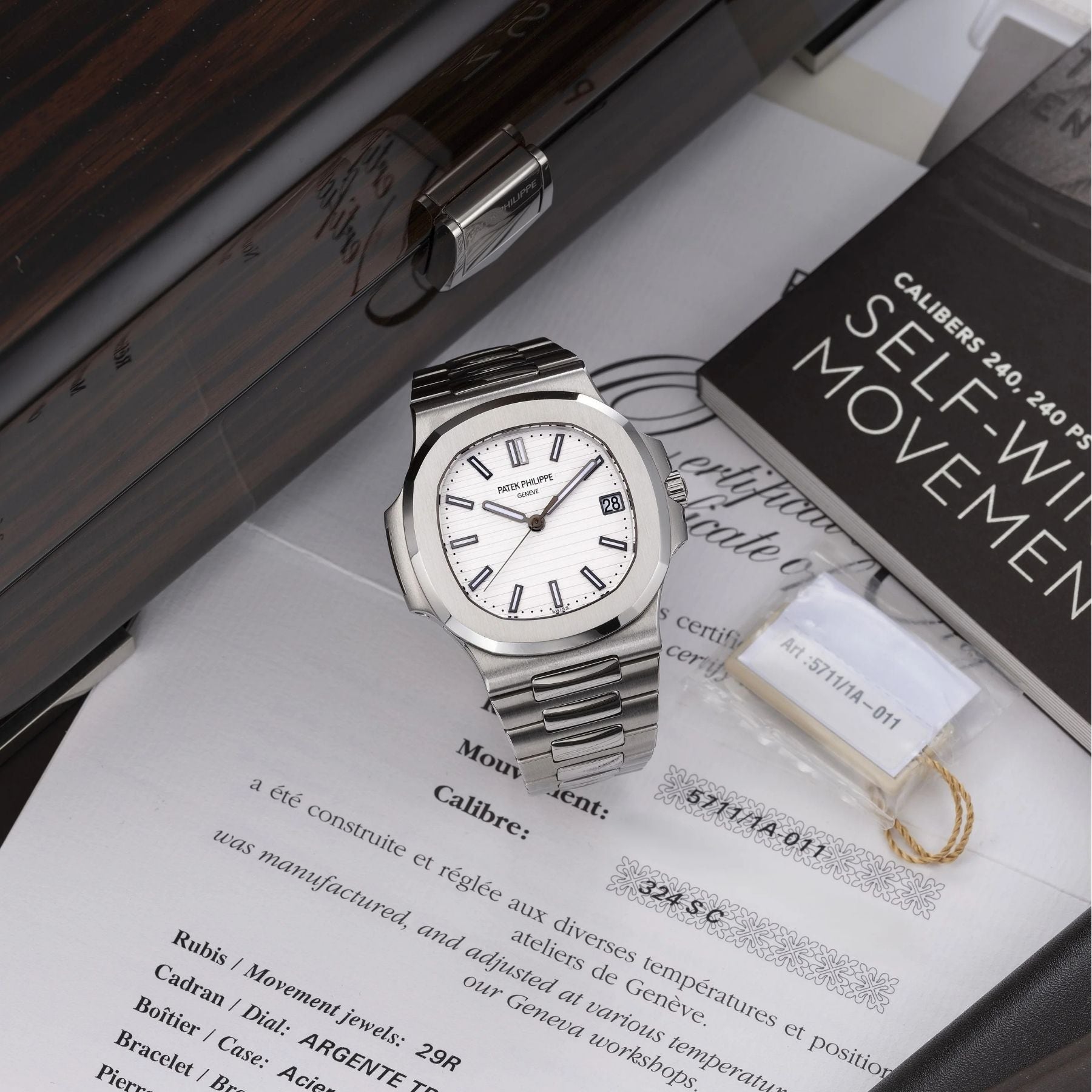 The Patek Philippe Nautilus Ref. 5711/1A-011with white dial, available from Phillips Perpetual.