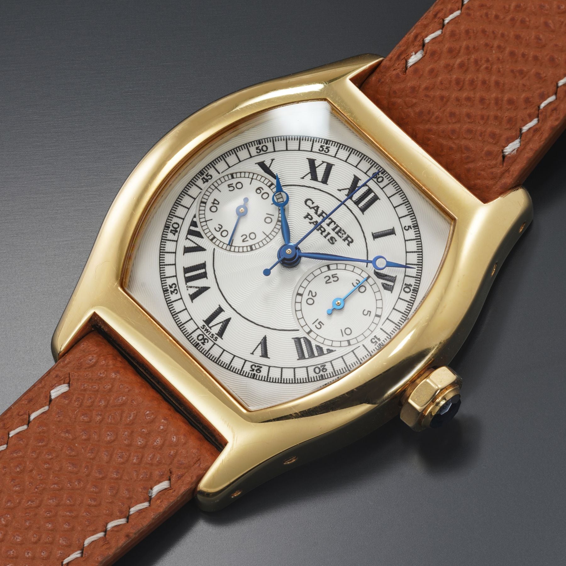 Lot 83: A circa 2000 Cartier Tortue Monopoussoir CPCP Ref. 2356E in 18k yellow gold, included in The Geneva Watch Auction XXIV. Estimate: CHF 20,000–40,000