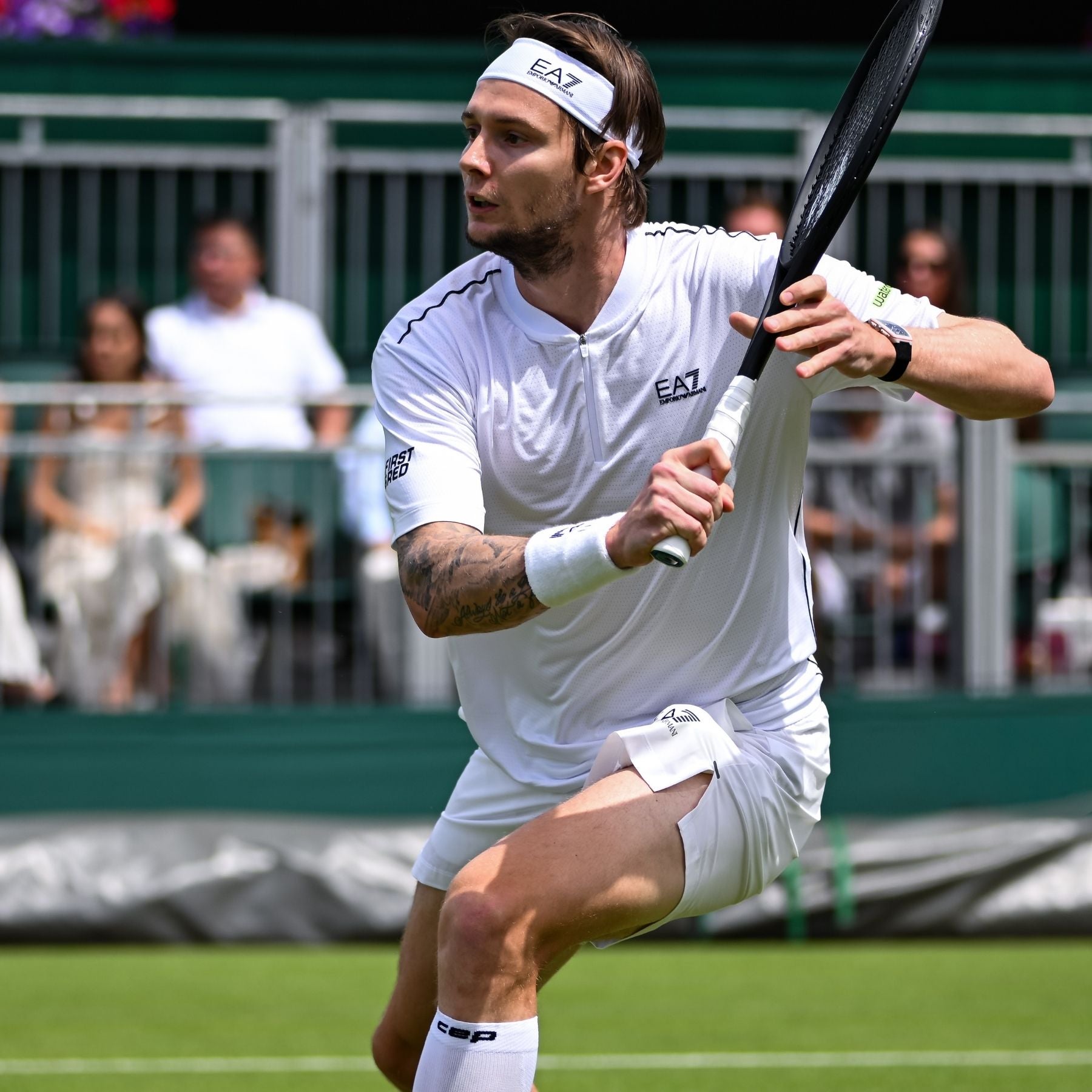 Tennis man Alexander Bublik in action on the court. 