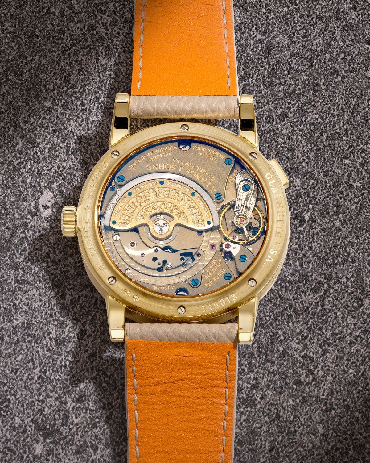 Lot 8051: A circa 2005 A. Lange & Söhne Saxonia Langematik Perpetual Ref. 820.021E in 18k yellow gold with a diamond-set bezel, included in the Phillips Hong Kong Sessions, Fall 2026. Estimate: HKD $220,000–450,000