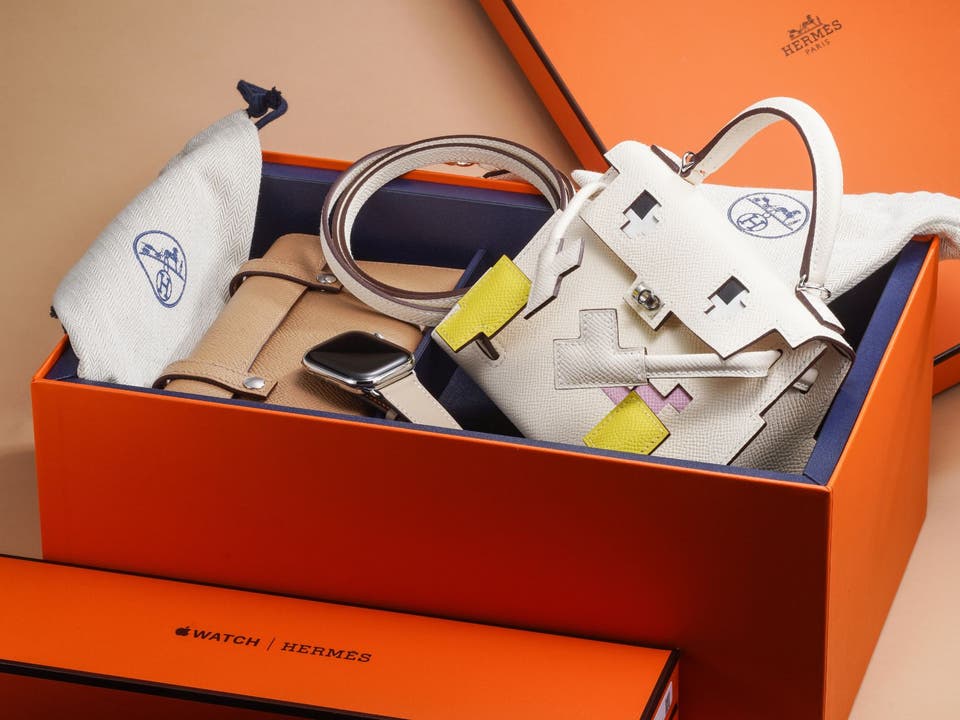 An Apple Watch Hermès with Hermès Kelly Doll Picto bag