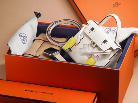 An Apple Watch Hermès with Hermès Kelly Doll Picto bag 