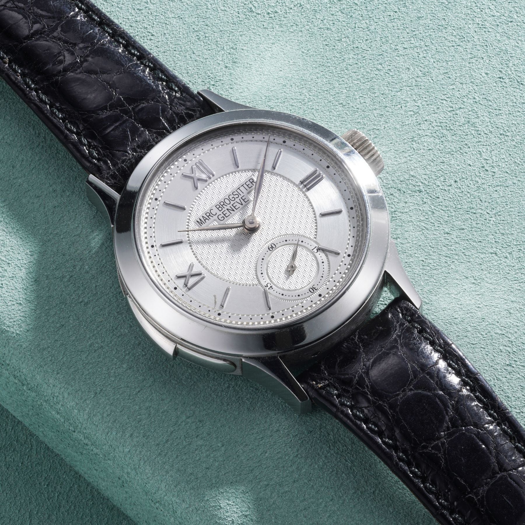 Lot 45: A circa 2005 Marc Brogsitter minute repeater in platinum with a Jean-Pierre Hagmann case, included in the Phillips Geneva Sessions, Fall 2026, Online Auction. Estimate: CHF 50,000–100,000