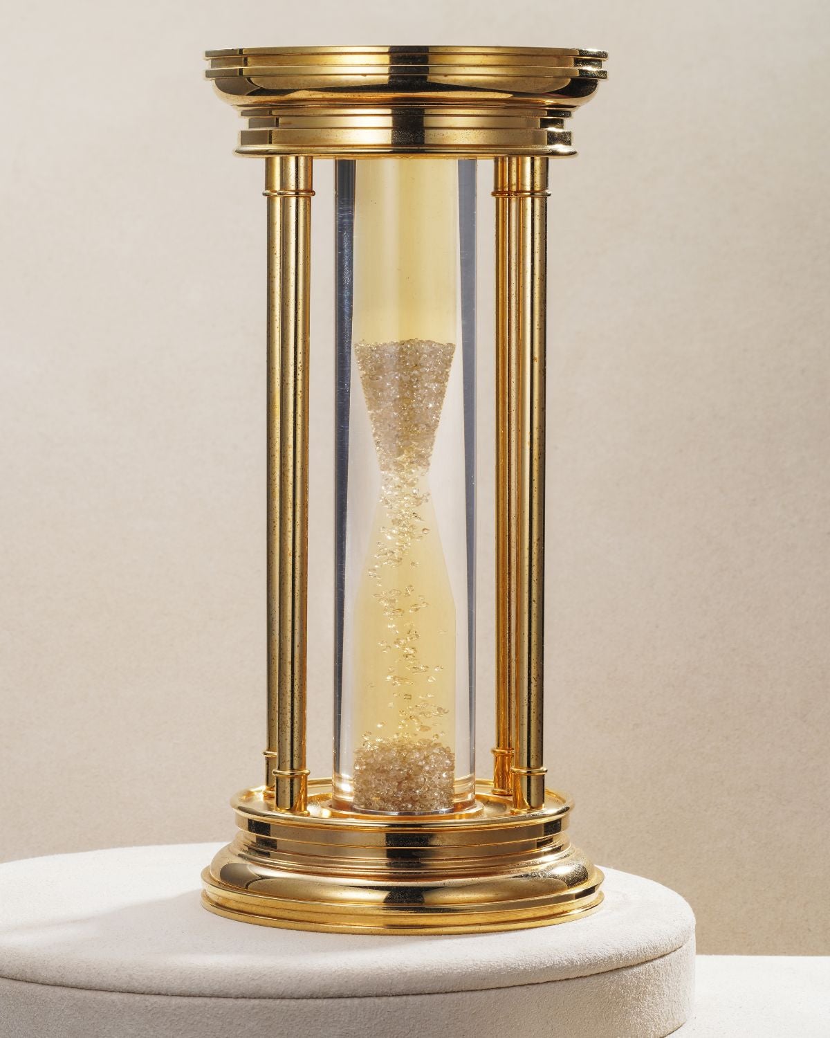 Lot 71: A circa 2000 De Beers “Starburst Diamonds 2000” hourglass containing more than 2,000 rough diamonds, included in the Phillips Geneva Sessions, Fall 2026, Online Auction. Estimate: CHF 2,000–4,000