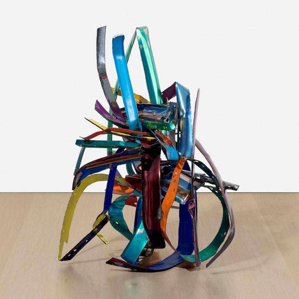 Crushed and welded metal sculpture by renowned artist John Chamberlain utilizing painted automobile parts, for sale at Phillips auction house.