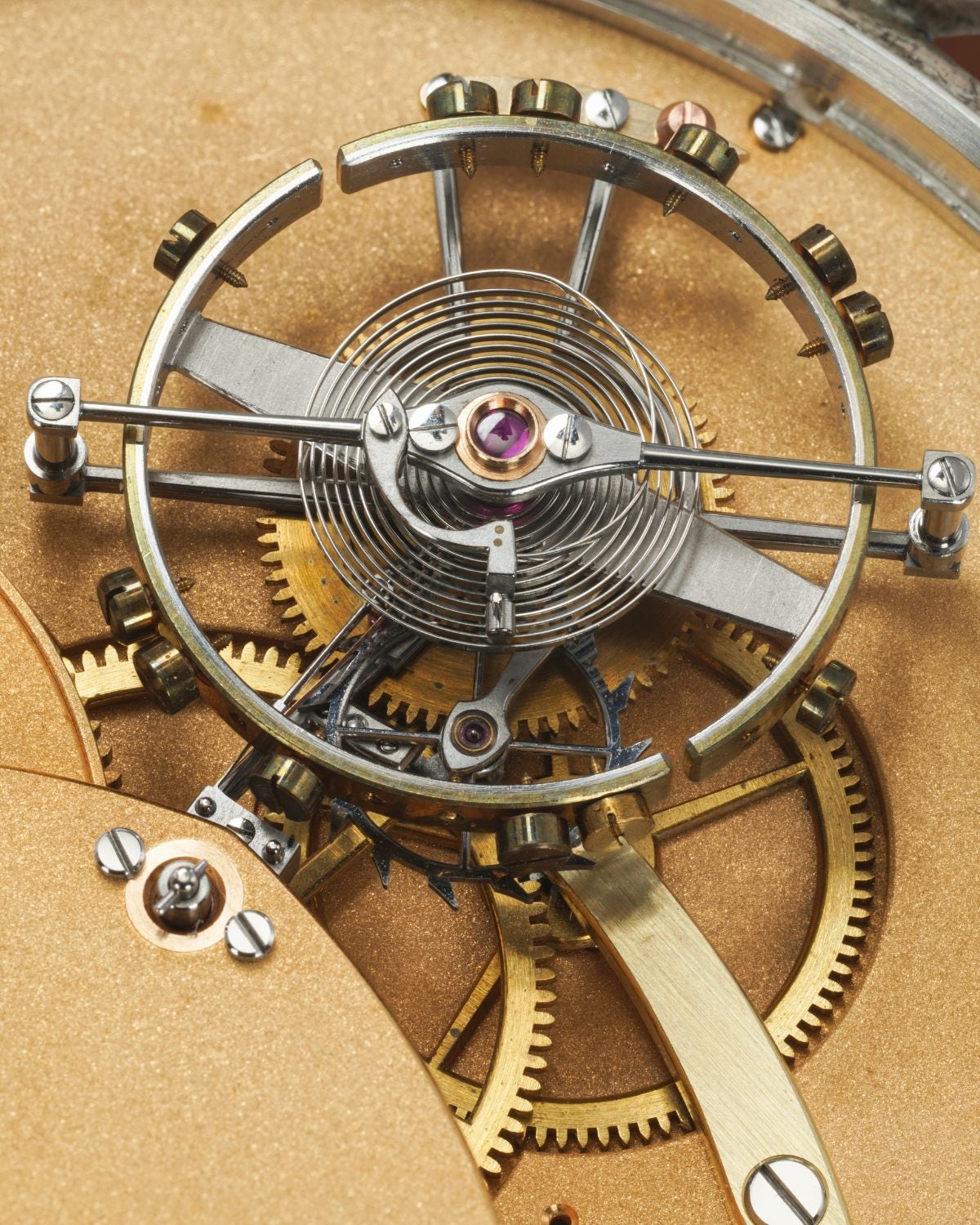 Lot 61: A circa 1985 Richard Miklosch flying tourbillon pocket watch with detent escapement in silver, included in The Geneva Watch Auction XXIV. Estimate: CHF 300,000–600,000