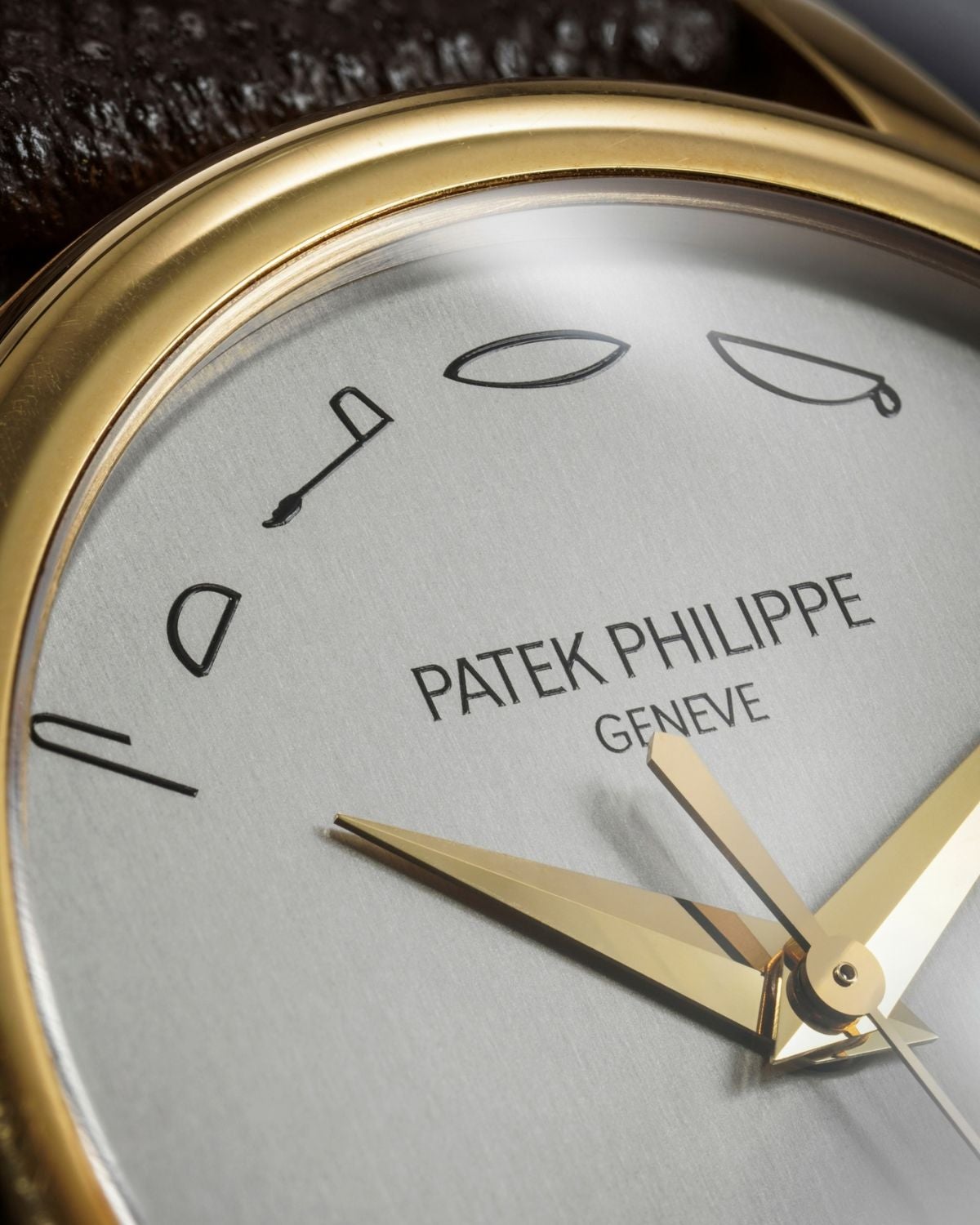 Lot 93: A unique 2002 Patek Philippe Ref. 3998 “VILIP STERKK” with an Egyptian hieroglyph dial in 18k yellow gold, most probably made for Philippe Starck, included in The Geneva Watch Auction XXIV. Estimate: CHF 80,000–160,000 