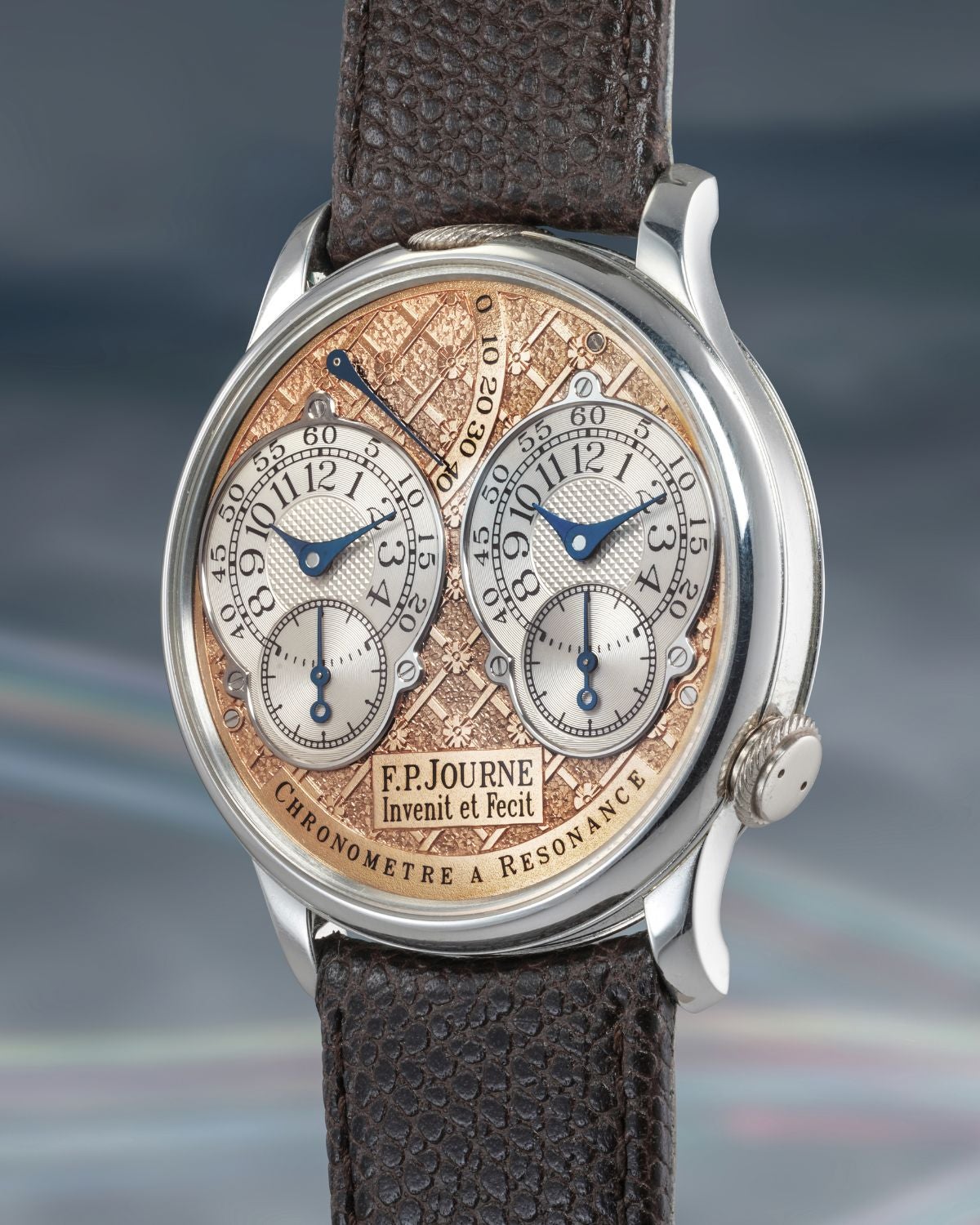 Lot 7: A 2002 F.P. Journe Chronomètre à Résonance “Régence” in platinum with a hand-engraved pink gold dial, included in The Geneva Watch Auction XXIV. Estimate: CHF 1,000,000–2,000,000 