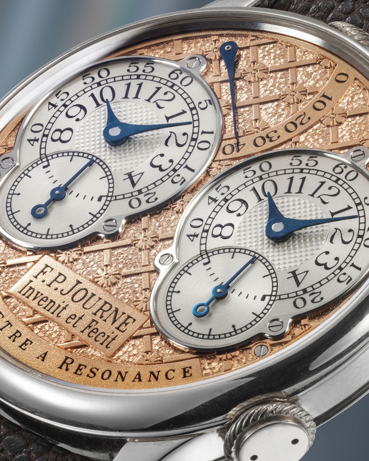 Lot 7: A 2002 F.P. Journe Chronomètre à Résonance “Régence” in platinum with a hand-engraved pink gold dial, included in The Geneva Watch Auction XXIV. Estimate: CHF 1,000,000–2,000,000 